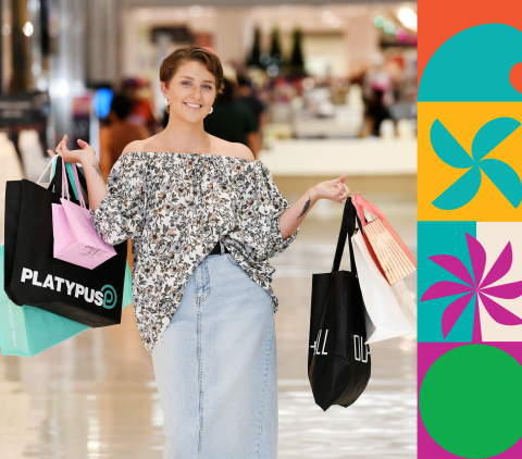 Woman holding lots of shopping bags