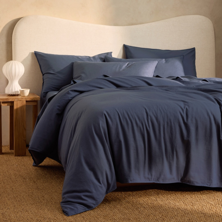 Bed with steel grey linen