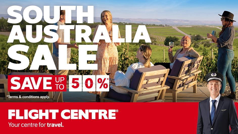 People enjoying a beautiful view of hill. Text 'Sout h Australia Sale. Save up to 50% at Flight Centre'