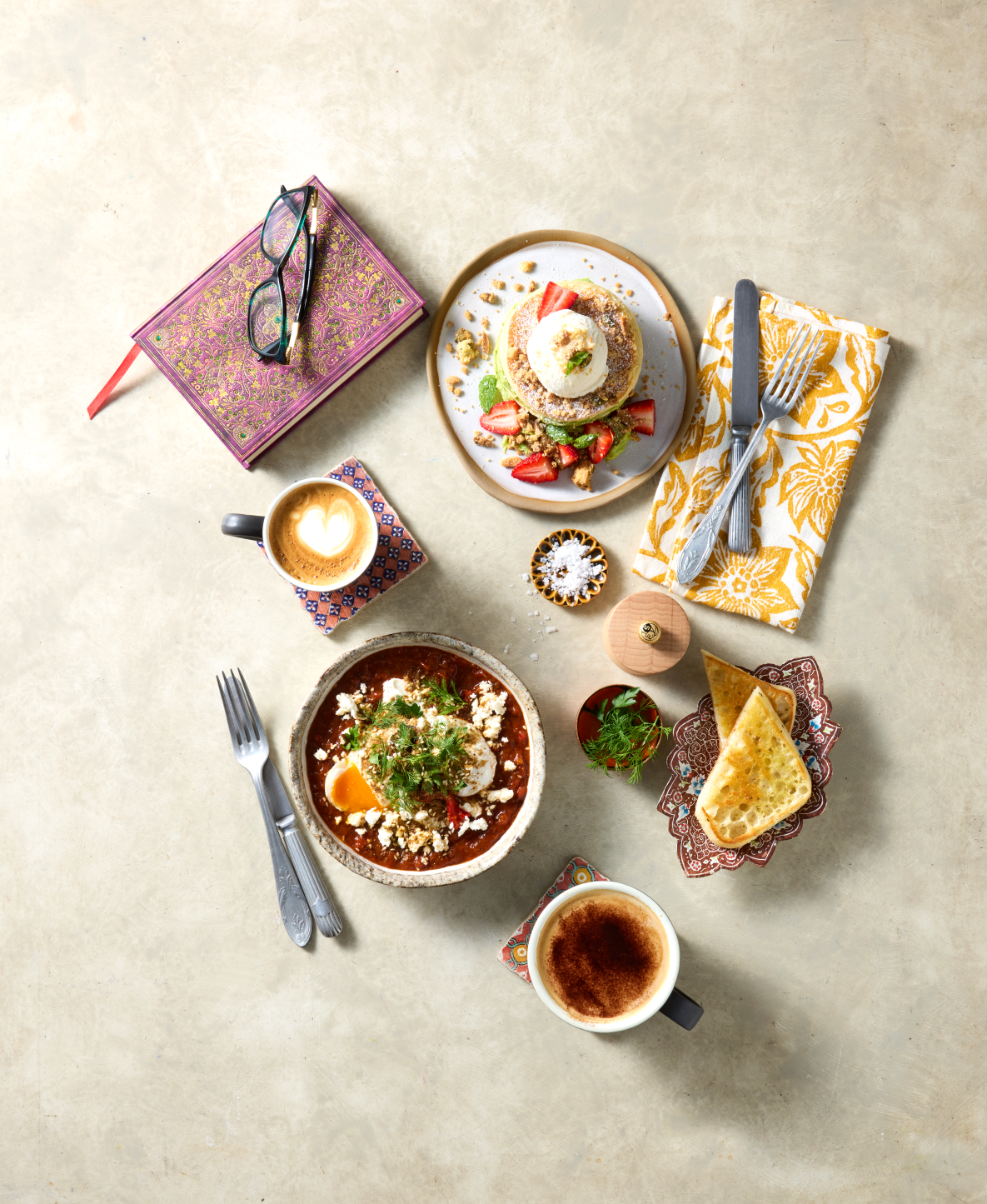 Beige background with a variety of Turkish breakfast items displayed in a "Lifestyle" style