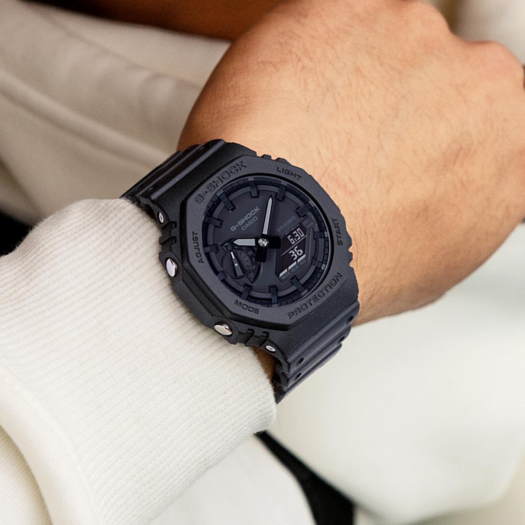 Man wearing a black watch