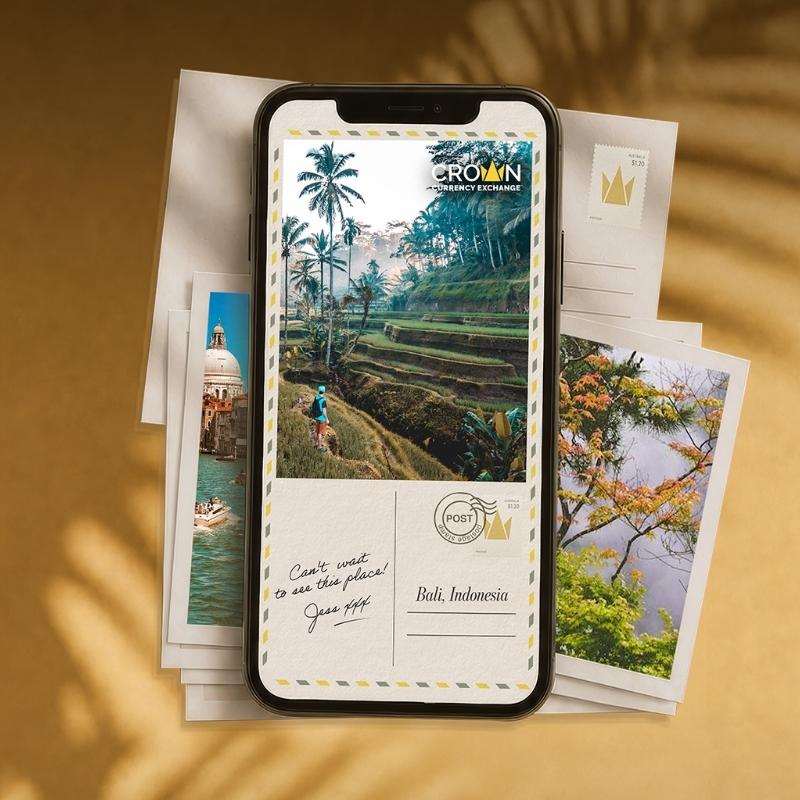 Phone with digital postcard. Crown Currency Exchange logo