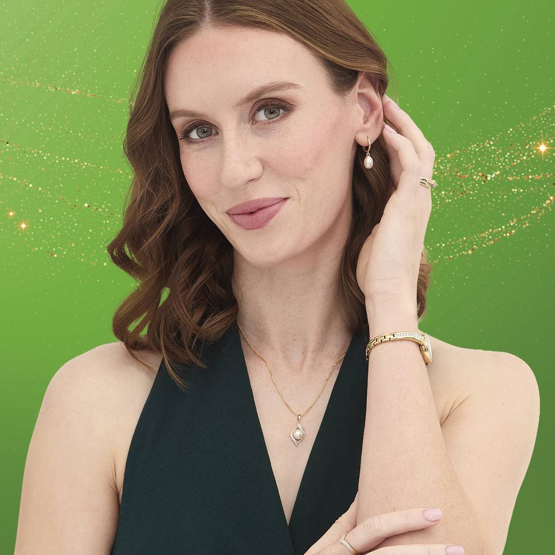 Woman wearing jewellery from Angus & Coote